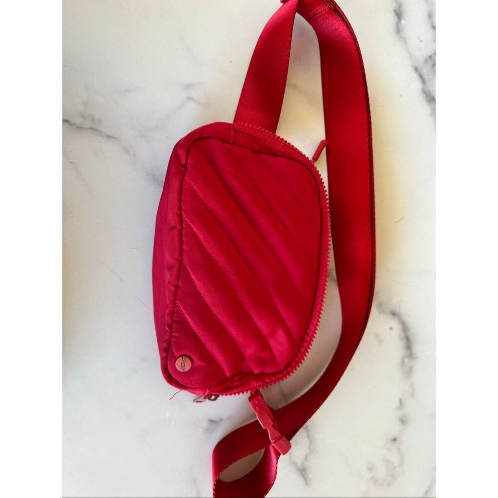 Studio solid  red quilted plush fanny pack easy clean adjustable waist purse